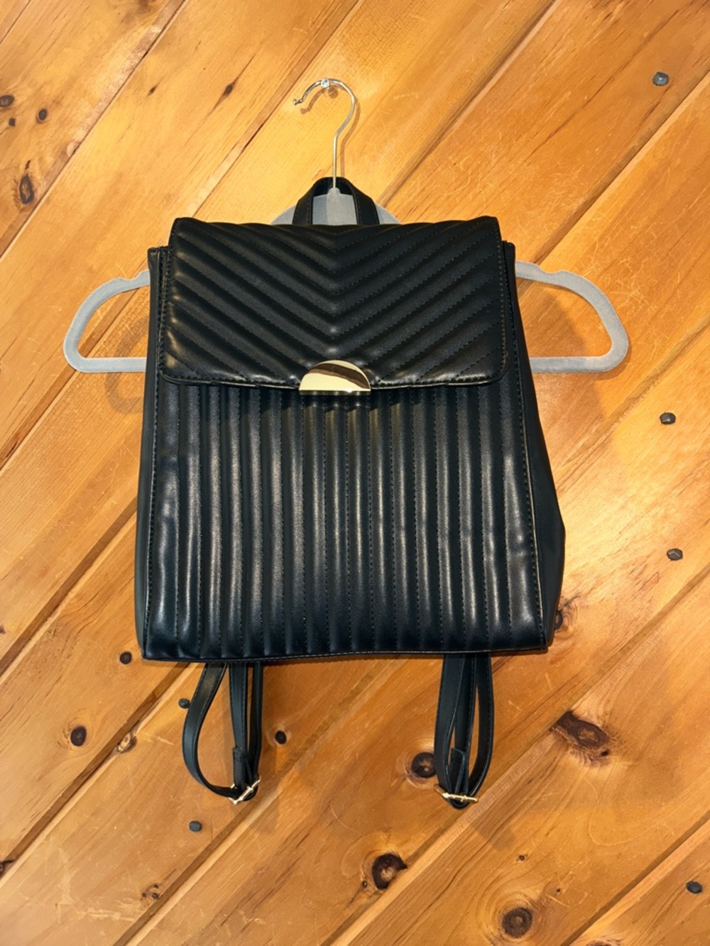 A New Day black quilted backpack purse